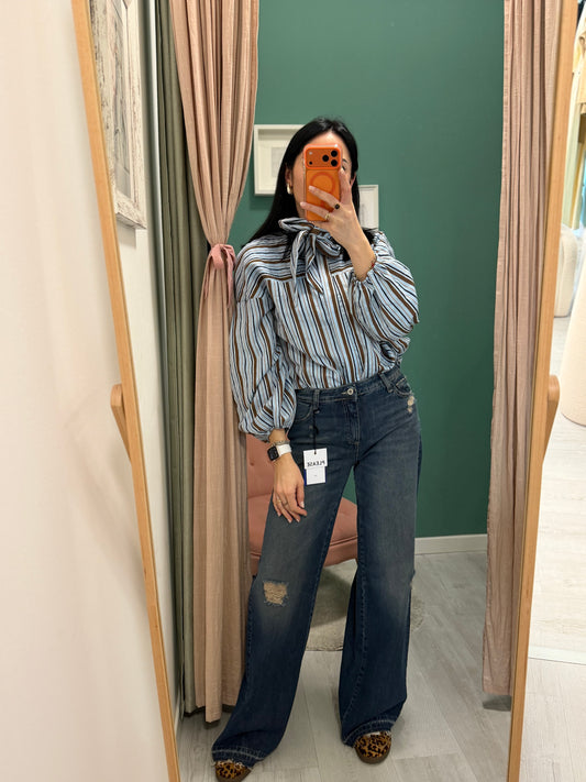 Please - jeans con dettagli rotture